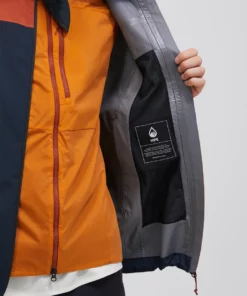 Peak Performance Trail Hipe Shell Jacket Men Spiced/Salute Blue/Desert Blow